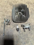 Hodaka Ace 100 Cylinder Head With Nuts And Stud Intake Manifold. Fixed Price $69.99.
