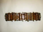 89 Honda GL1500 Left Camshaft Holder. Fixed Price $11.02.