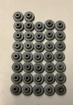 Lot Of 37 Bmw 11127654978 Rubber Bushing (B225). Fixed Price $160.00.