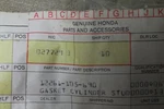 Nos Honda Cylinder Stud Gasket 12261-105-690. Fixed Price $9.00.